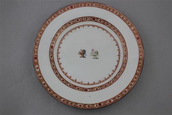 An English porcelain armorial plate and a French armorial breakfast cup, late 18th and late 19th century, 13cm. diam.